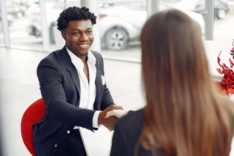 Business owner meeting a marketing agency