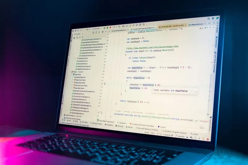 HTML and CSS code open in an editor on a laptop screen