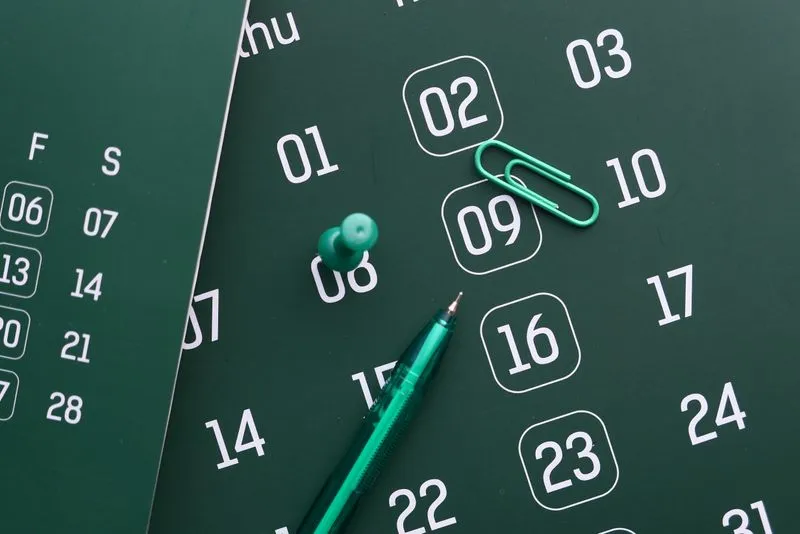 Planning calendar and growth chart on a desk