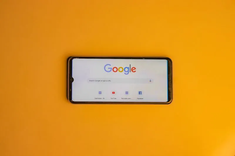 Business owner searching on Google on a smartphone in Nigeria
