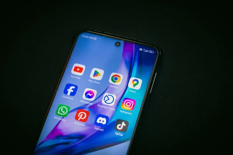Social media app icons on a phone screen