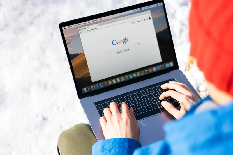Person working through website tools on a laptop