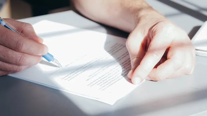 Business proposal document being reviewed